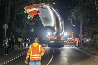 Transport of a 68 metre long, 22 tonne blade of a wind turbine, here in Schwelm, with a