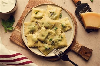 Ravioli with spinach and cheese, vegetarian food, on a beige background, no people.selective focus,