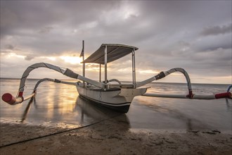 Jukung in the sea, typical landscape shot with a view of the horizon over the water, taken from a