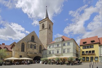 Gothic Ägidienkirche and street pub with people and parasols, Wenigemarkt, Erfurt, Thuringia,