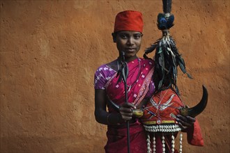 Portrait of a teenage girl from the Bison horn maria tribe, Bastar region, Chhattisgarh, India. She