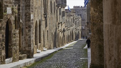 A medieval street with cobblestones and historic stone buildings, quiet atmosphere, Knights Street,