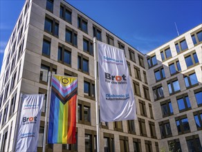 Flags in front of the office of Bread for the World, Berlin-Mitte, Germany, Europe