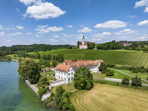 Aerial view of Maurach Castle on Lake Constance, below the Birnau pilgrimage church on a vineyard,