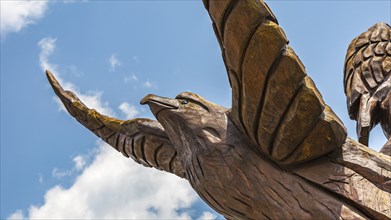 Sculpture of an eagle by Dayton Scroggins carved from tree trunk damaged by Hurricane Katrina on