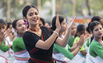 An instructor dance Bihu, as she teach participants during a Bihu dance workshop, ahead of Rongali