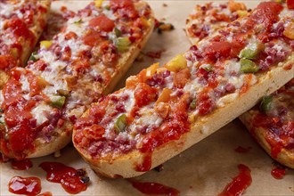 Pizza on a baguette, top view, close-up, no people, fast food, street food