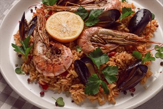 Seafood paella, shrimp and mussels risotto, rice, homemade, top view, no people