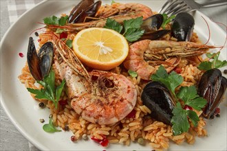 Seafood paella, shrimp and mussels risotto, rice, homemade, top view, no people