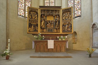 Gothic high altar by Linhart Könbergk 1492 with sculptures, colourful stained glass windows,