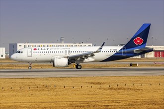 An Airbus A320neo aircraft of Qingdao Airlines with the registration number B-320C at Daxing