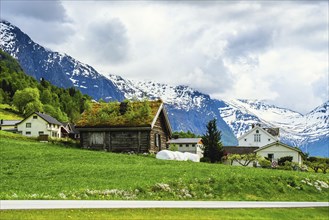 Mountains and Fjord over Norwegian Village, Olden, Innvikfjorden, Norway, Europe