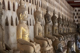 Ancient Buddha statues in the courtyard of Wat Si Saket, Vientiane, Vientiane province, Laos, Asia