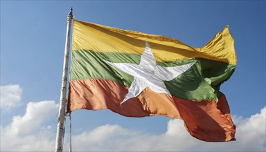 Flags, the national flag of Myanmar flutters in the wind