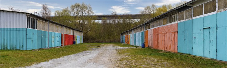 Industrial site with coloured Tor tor on the warehouses, Stralsund, Mecklenburg-Vorpommern,