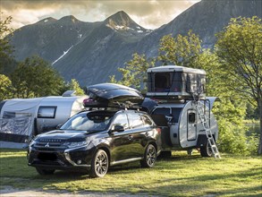 Small caravan with roof top tent, campsite near Andalsnes, Norway, Europe