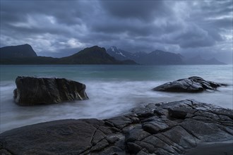 Seascape on the beach at Haukland. View of the mountains of Vestvagoya and Myrland on Flakstadoya.