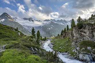 Mountain landscape with mountain stream Zemmbach and mountain hut Berliner Hütte, behind mountain