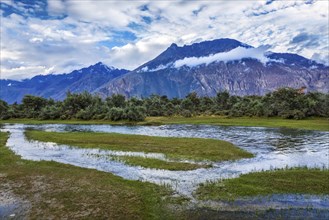 Panorama of Himalayas and landscape of Nubra valley on sunset. Hunber, Nubra valley, Ladakh, India,