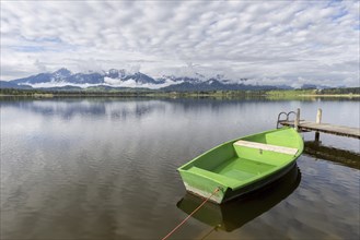 Rowing boat at sunrise, Hopfensee, Hopfen am See, near Füssen, OstallgÃ¤u, AllgÃ¤u, Bavaria,