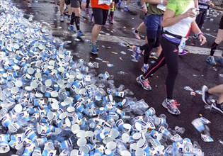 Empty drinking cups lying on the street along the marathon route, Berlin, 25.ö09.2016