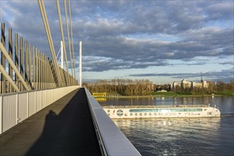 Arosa river cruise ship under the A40 Neuenkamp bridge, piers and stay cables of the new motorway