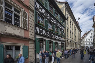 Visitors and guests in front of the Gasthaus Schlenkerle, famous smoked beer brewery,