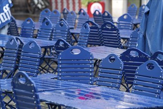 Catering, blue chairs and tables in a beer garden, outdoor catering, empty, closed