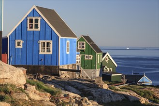 Typical Greenlandic houses by the sea, summer, sunny, Upernavik, West Greenland, Greenland, North