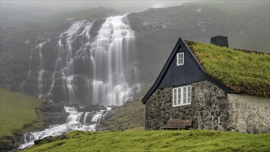 Saksun, waterfall and village view, Faroe Islands, Faroe Islands, Denmark, Europe