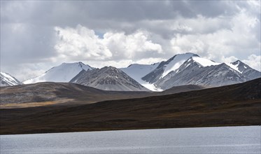 Mountain lake and glaciated and snow-covered peaks, Ak Shyrak Mountains, near Kumtor, Kara-Say,