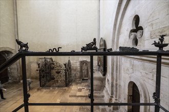 Metal figures on the banister leading to the gallery in Naumburg Cathedral, Saxony-Anhalt, Germany,