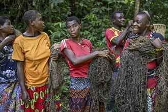 Pygmy woman of the Baka or BaAka people with their hunting nets, Dzanga-Sangha Special Dense Forest