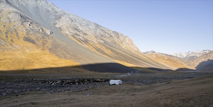 Barren landscape, mountain valley with yurt, Naryn province, Kyrgyzstan, Asia