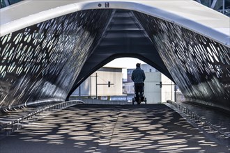 Light effects from the sun in the Parkbruk, a cycle and pedestrian bridge in the city centre of