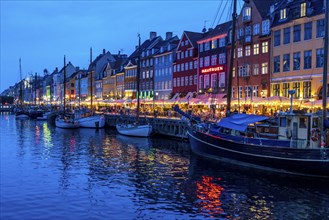 Nyhavn, in the Frederiksstaden district, in the evening, harbour district with houses over 300