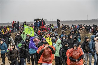 Many thousands of demonstrators march after a demonstration against the demolition of the lignite