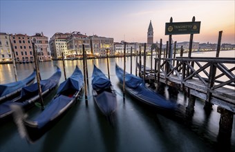 Venetian gondolas, boat dock at the customs office on the Grand Canal, Gondola Traghetto Dogana,