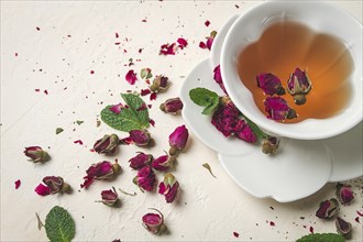 Cup of tea, damask rose, pink tea, close-up