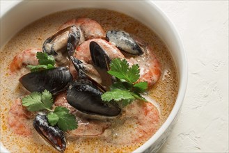 Seafood, shrimp and mussels, in creamy garlic sauce, homemade, no people