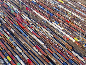 Deutsche Bahn AG marshalling yard. Many goods trains are parked on the tracks with tank wagons, car