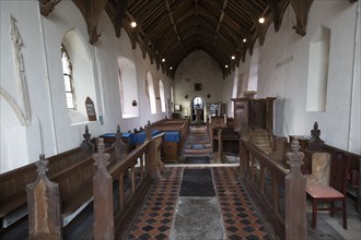 Pews in nave of church of Ilketshall St Andrew, Suffolk, England, UK