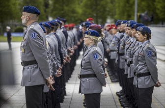 Soldiers from various armed forces during the final roll call at the Federal Ministry of Defence to