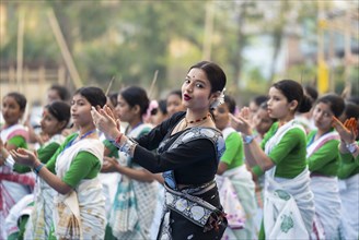 An instructor dance Bihu as she teach bihu dance at a workshop, ahead of Rongali Bihu festival, in