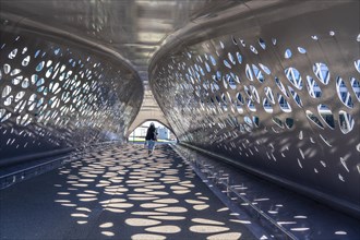 Light effects from the sun in the Parkbruk, a cycle and pedestrian bridge in the city centre of