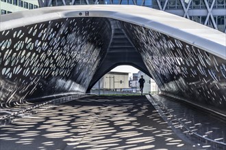 Light effects from the sun in the Parkbruk, a cycle and pedestrian bridge in the city centre of