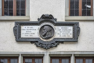 Relief with portrait of Jan Hus on the façade of a medieval house, now the Jan Hus Museum, in the