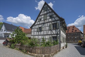 Historic half-timbered house with cottage garden, Forchheim, Upper Franconia, Bavaria, Germany,