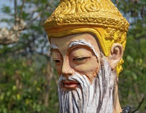 Deity statue, Phousi or Phu Si Hill, Luang Prabang, Laos, Asia