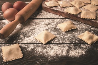 Cheese, Spinach ravioli, on a wooden table, selective focus, rustic style, horizontal, no people